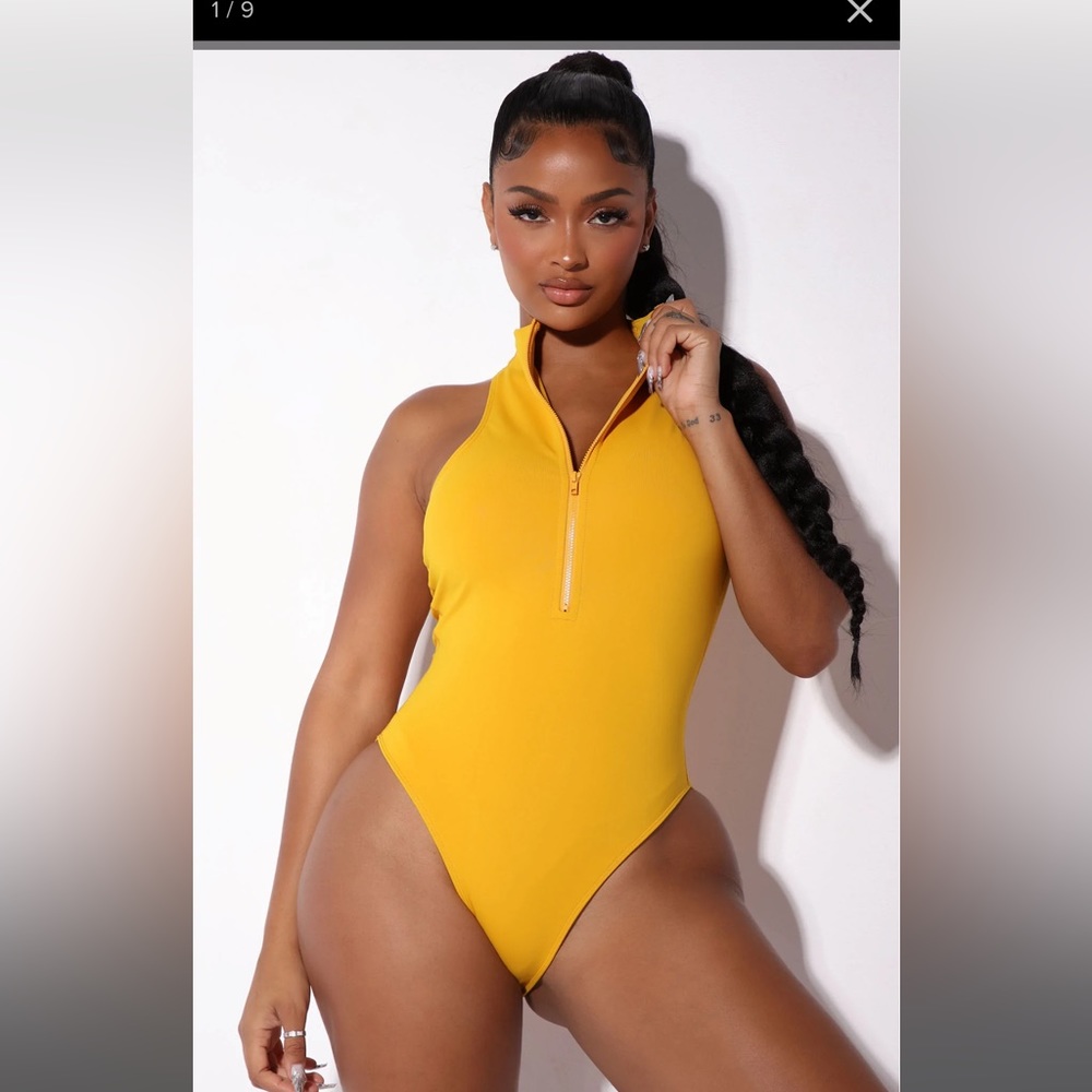 Fashion so a body suit. Size small. Never worn.